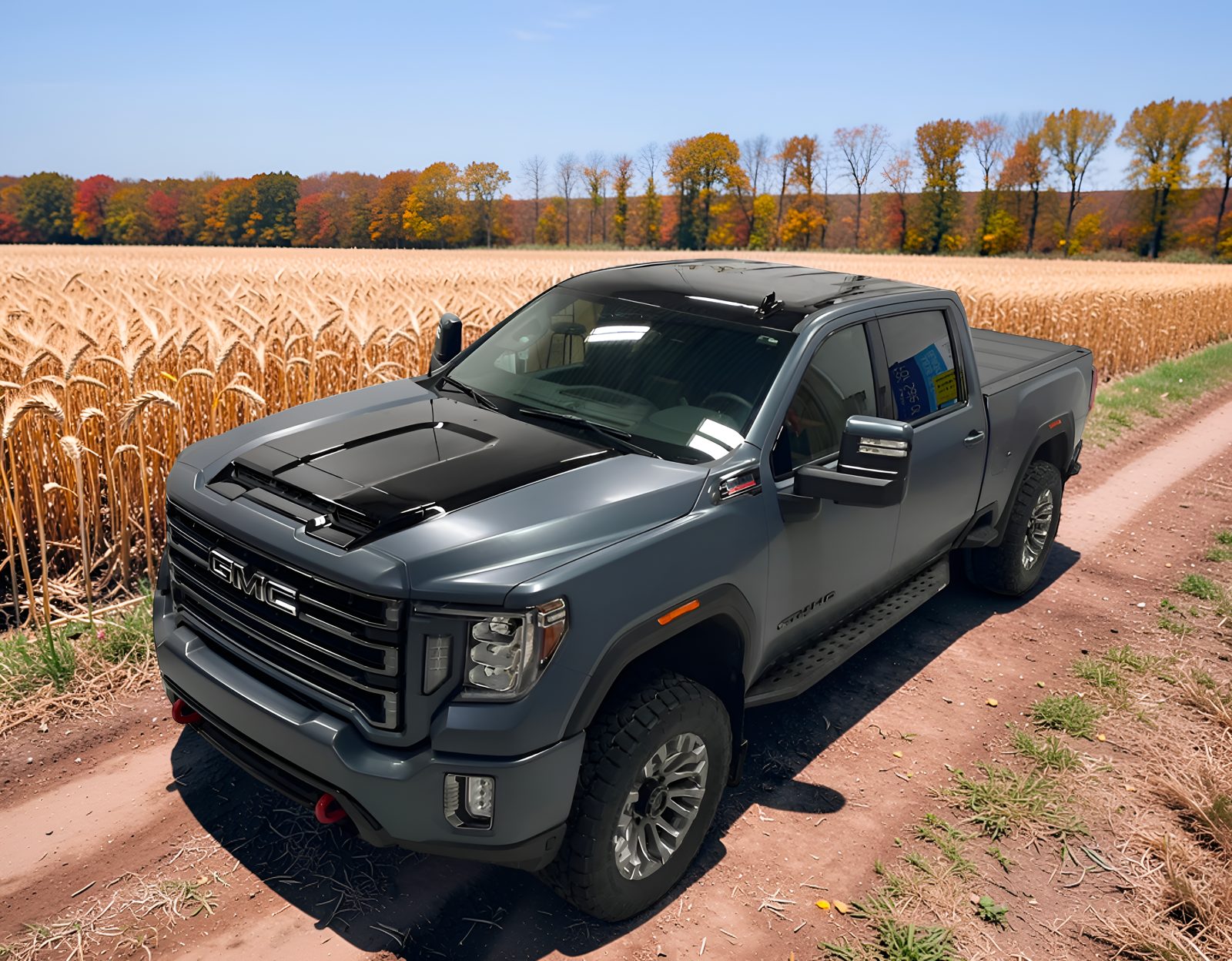 GMC truck with grey colour change wrap and black hood