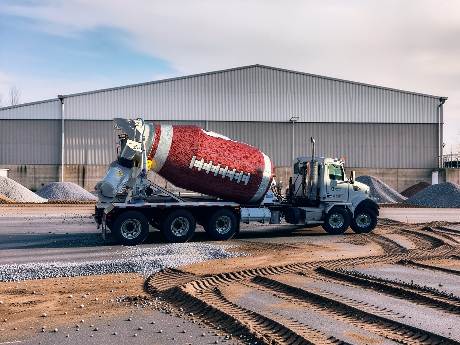 Heidelberg Materials mixer truck wrapped as a football